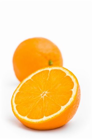 simsearch:400-05381130,k - One whole and one cut orange Stock Photo - Budget Royalty-Free & Subscription, Code: 400-06065210