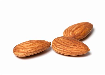 Almonds isolated on white background Stock Photo - Budget Royalty-Free & Subscription, Code: 400-06065264