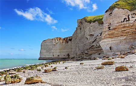 picture of land beach resort - Image of the rocky beach from Le Tileul in the Upper Normandy in the North of France. Stock Photo - Budget Royalty-Free & Subscription, Code: 400-06065586