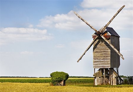 simsearch:400-06101286,k - Traditional wooden windmill in France in the Eure &Loir Valley region.This is Saint-Thomas mill. Stock Photo - Budget Royalty-Free & Subscription, Code: 400-06065589