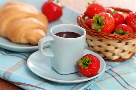 Delicious breakfast with hot chocolate, fresh croissants and strawberry Stock Photo - Budget Royalty-Free & Subscription, Code: 400-06065731