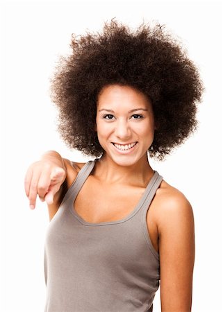 simsearch:400-06065810,k - Happy Afro-American young woman isolated on white looking and pointing to the camera Foto de stock - Super Valor sin royalties y Suscripción, Código: 400-06065811