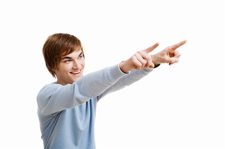 simsearch:400-05912376,k - Portrait of a handsome young man pointing, isolated over a white background Foto de stock - Super Valor sin royalties y Suscripción, Código: 400-06065842