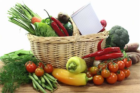 silencefoto (artist) - a checkered note pad and various vegetables Stockbilder - Microstock & Abonnement, Bildnummer: 400-06066320