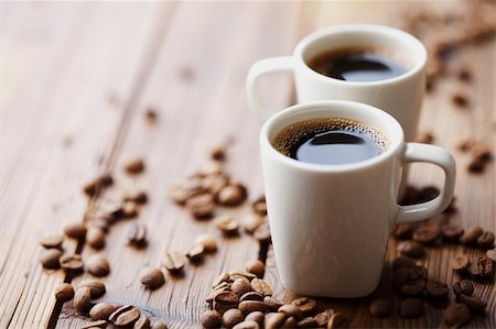 rustic modern - two modern espresso cups on a wooden table Stock Photo - Budget Royalty-Free & Subscription, Code: 400-06066458