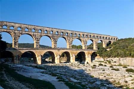 View of Pont du Gard, an old Roman aqueduct in southern France near Nimes Photographie de stock - Aubaine LD & Abonnement, Code: 400-06066500