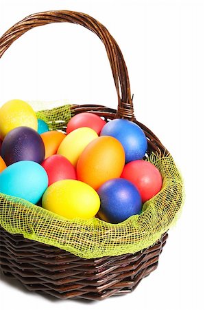 simsearch:400-07406705,k - Multicolored Easter eggs in wicker basket isolated on white background Foto de stock - Super Valor sin royalties y Suscripción, Código: 400-06066714