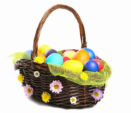 simsearch:400-07406705,k - Multicolored Easter eggs in wicker basket isolated on white background Foto de stock - Super Valor sin royalties y Suscripción, Código: 400-06066718