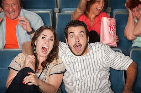 screaming woman in fear - Group of people in audience react in fear Stock Photo - Budget Royalty-Free & Subscription, Code: 400-06066861
