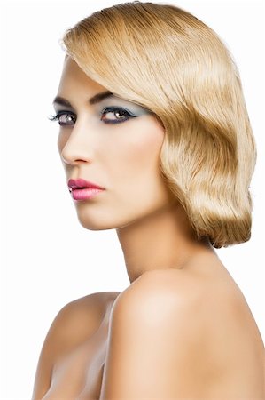 simsearch:400-04420197,k - blond beautiful woman with strong make up and an old fashion hair stylish in beauty portrait close up. she is turned to the right and looks in to the lens. Stock Photo - Budget Royalty-Free & Subscription, Code: 400-06067013