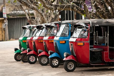 Tuk-tuk is the most popular transport type on Asian streets.  . Stock Photo - Budget Royalty-Free & Subscription, Code: 400-06067247