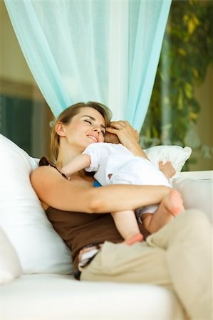 simsearch:400-06067090,k - Mother hugging baby at terrace Stockbilder - Microstock & Abonnement, Bildnummer: 400-06067375