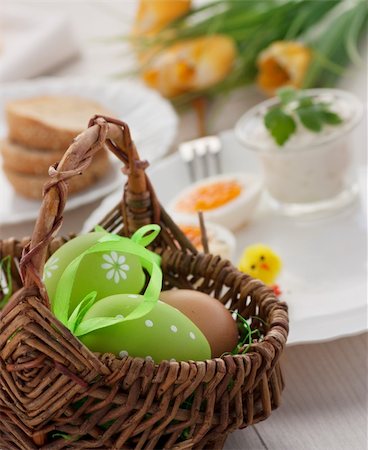 family cheese - Traditional Easter breakfast. Table setting with Boiled eggs with ham, cottage cheese and Easter decorations Stock Photo - Budget Royalty-Free & Subscription, Code: 400-06067558