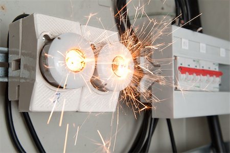 short circuit - Overloaded electrical circuit causing fuse to break Photographie de stock - Aubaine LD & Abonnement, Code: 400-06067843