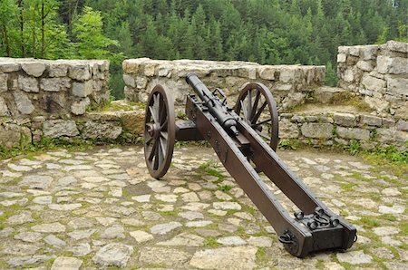 ancient cannon at a castle wall, photo taken on Strecno castle near Zilina, Slovakia. Stock Photo - Budget Royalty-Free & Subscription, Code: 400-06067970