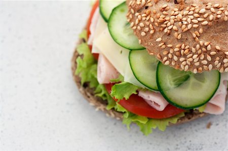 simsearch:400-05881424,k - Delicious ham, cheese and salami sandwich with vegetables, lettuce, cherry tomatoes Stockbilder - Microstock & Abonnement, Bildnummer: 400-06068649