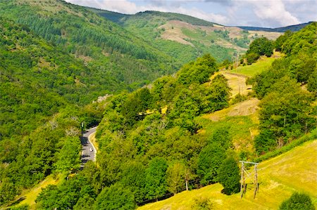 simsearch:400-05317345,k - Winding Paved Road in the French Alps Photographie de stock - Aubaine LD & Abonnement, Code: 400-06069074