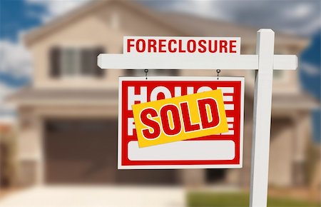 eviction - Sold Foreclosure Home For Sale Sign and House with Dramatic Sky Background. Stock Photo - Budget Royalty-Free & Subscription, Code: 400-06069379