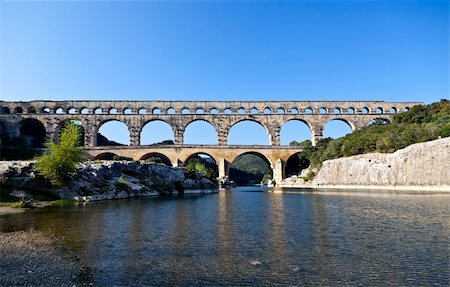 View of Pont du Gard, an old Roman aqueduct in southern France near Nimes Photographie de stock - Aubaine LD & Abonnement, Code: 400-06069557