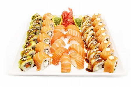 simsearch:400-04397537,k - a large plate of Japanese sushi on white background Stockbilder - Microstock & Abonnement, Bildnummer: 400-06069772