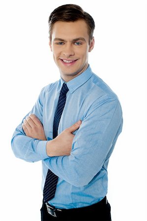 simsearch:400-07820348,k - Successful businessman posing with folded arms on white background Photographie de stock - Aubaine LD & Abonnement, Code: 400-06069841