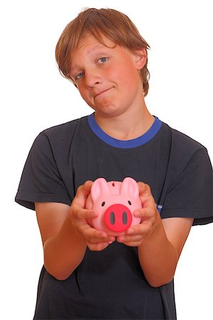 Portrait of a skeptical looking boy holding his piggy bank on white background Stock Photo - Budget Royalty-Free & Subscription, Code: 400-06060128