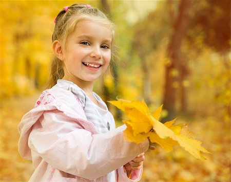 Autumn portrait of cute little caucasian girl Stock Photo - Budget Royalty-Free & Subscription, Code: 400-06060551