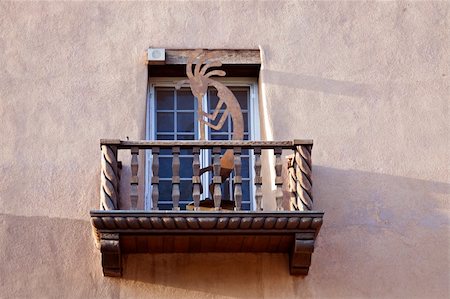 House balcony. Pueblo Revival style. Santa Fe, New Mexico. Photographie de stock - Aubaine LD & Abonnement, Code: 400-06060800