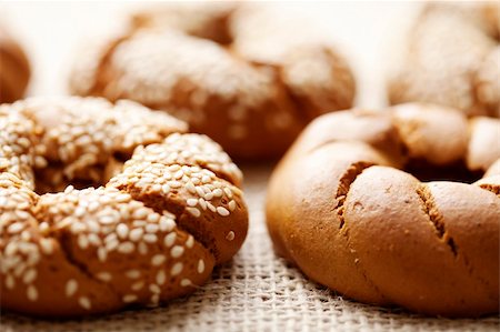 sesame bagel - fresh rustic bread/bagels, shallow dof Stock Photo - Budget Royalty-Free & Subscription, Code: 400-06060978
