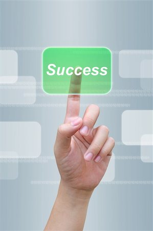 hand pushing success button on a touch screen interface Stock Photo - Budget Royalty-Free & Subscription, Code: 400-06060972
