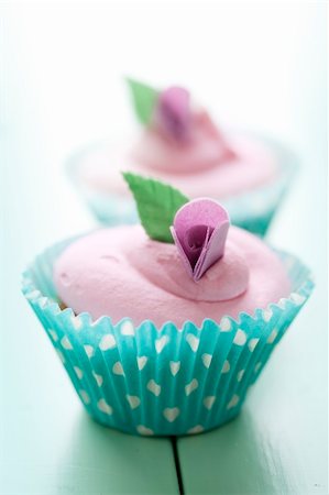 pink cupcake flowers - closeup of beautiful summer cupcake with strawberry flavoured cream Stock Photo - Budget Royalty-Free & Subscription, Code: 400-06061026