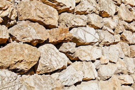 Horizontal landscape of an angled shot of an example of Kashmiri dry stone wall along the footpath to Shiva Devi temple of the Trikuta mountain range of the Himalayas in northern India. Stock Photo - Budget Royalty-Free & Subscription, Code: 400-06061071