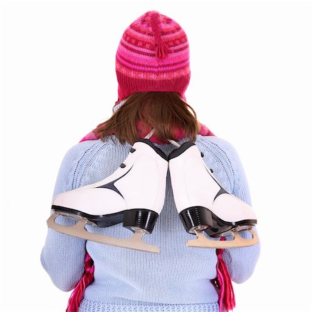 simsearch:400-04319654,k - A picture of a pair of figure skates on the back of the woman Stockbilder - Microstock & Abonnement, Bildnummer: 400-06061160