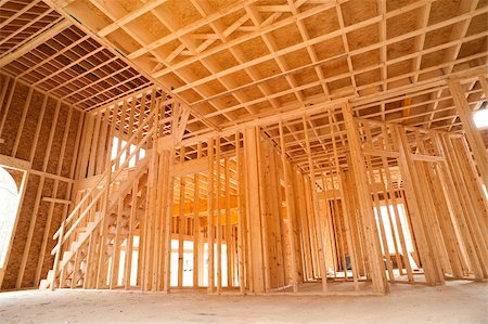 Interior framing of a new house under construction Fotografie stock - Microstock e Abbonamento, Codice: 400-06061251