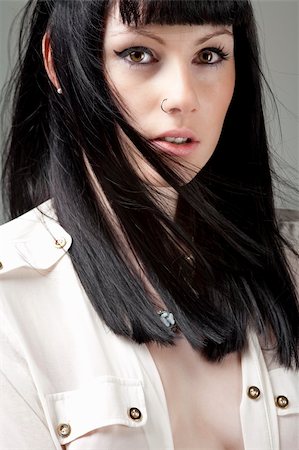 studiofi (artist) - Young woman in a white shirt and long black hair Photographie de stock - Aubaine LD & Abonnement, Code: 400-06061334