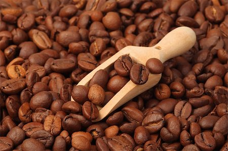 roasted coffee beans with wooden spoon, texture Stock Photo - Budget Royalty-Free & Subscription, Code: 400-06061650