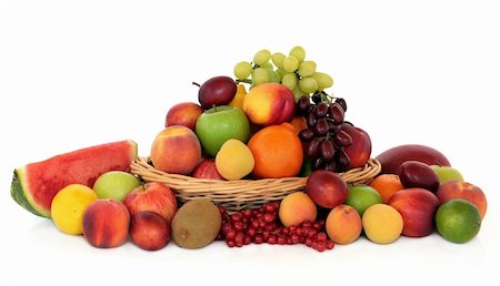 simsearch:400-07510855,k - Large fruit collection in a wicker basket and loose over white background. Photographie de stock - Aubaine LD & Abonnement, Code: 400-06062103