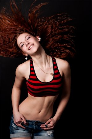 Young sexy dancing woman black background Stock Photo - Budget Royalty-Free & Subscription, Code: 400-06062508