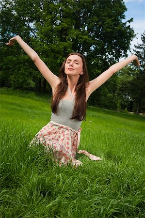 Girl in a grove looking in the sky Stock Photo - Budget Royalty-Free & Subscription, Code: 400-06063060