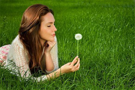 fun park mouth - Girl with dandelionson green field Stock Photo - Budget Royalty-Free & Subscription, Code: 400-06063063