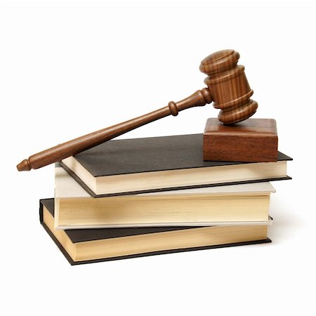 An isolated pile of books with a wooden gavel resting on top. Photographie de stock - Aubaine LD & Abonnement, Code: 400-06063123