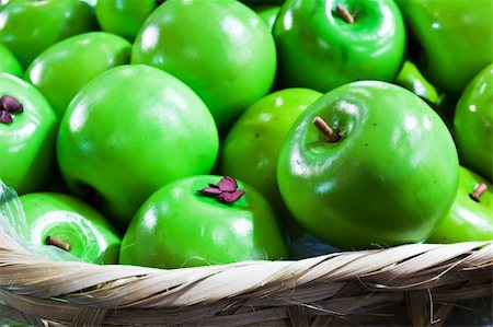 simsearch:400-05033339,k - Fake green apple in basket Stock Photo - Budget Royalty-Free & Subscription, Code: 400-06063139