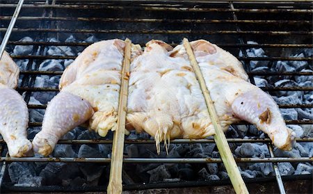 Roasting chicken on the chargrill Stock Photo - Budget Royalty-Free & Subscription, Code: 400-06063131