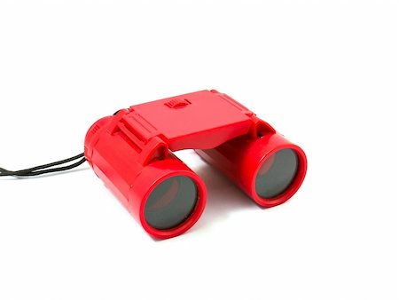 person focusing telescope - Red Binoculars Isolated on white background Stock Photo - Budget Royalty-Free & Subscription, Code: 400-06063142