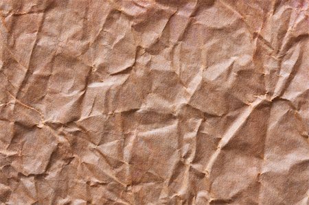 sheet of paper wrinkled - Texture of crumpled craft paper full frame Stock Photo - Budget Royalty-Free & Subscription, Code: 400-06063238