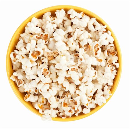 popcorn white background - Bowl of popcorn isolated on white background. Top view Stock Photo - Budget Royalty-Free & Subscription, Code: 400-06063286