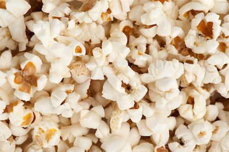 simsearch:400-04913050,k - Popcorn background Photographie de stock - Aubaine LD & Abonnement, Code: 400-06063289