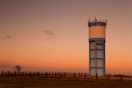 simsearch:400-05249204,k - Historic water reservoir brick tower at sunset Stock Photo - Budget Royalty-Free & Subscription, Code: 400-06063526