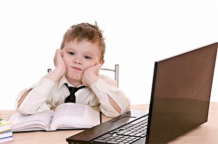 sad boy on a chair - boy pupil thinks for in time  homework Stock Photo - Budget Royalty-Free & Subscription, Code: 400-06063547