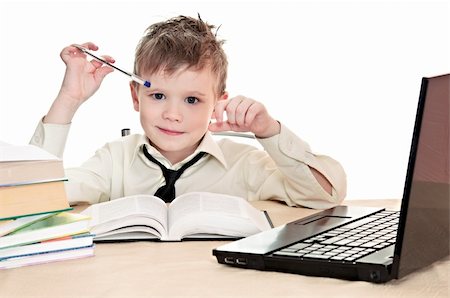 simsearch:400-05078169,k - boy pupil thinks for in time  homework Fotografie stock - Microstock e Abbonamento, Codice: 400-06063549